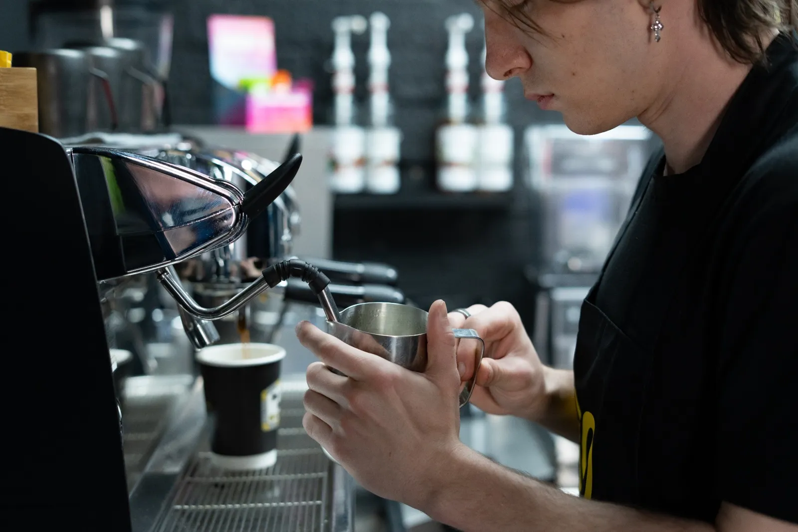 Barista making coffee close-up